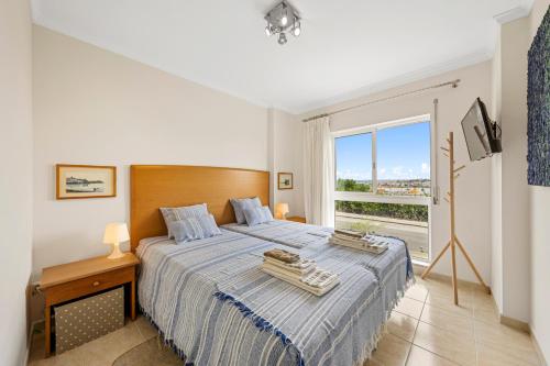 Pé na Areia Praia da Rocha