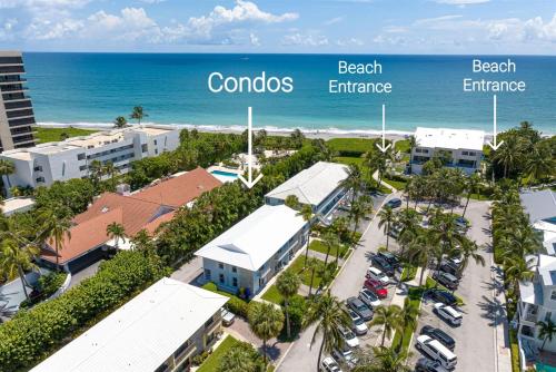 an aerial view of a resort with the ocean in the background at The Beach Villa in Juno! 1-Steps to the Beach in Juno Beach
