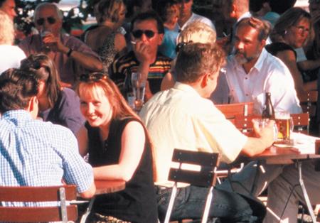 a group of people sitting at tables in a restaurant at Landgasthof Bei Kleins in Löhnberg
