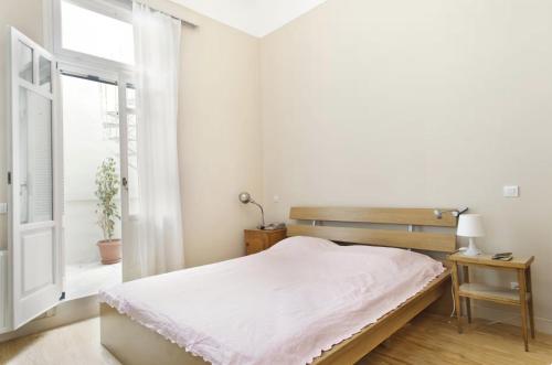 Spacious 2-Bedroom Neoclassical Apartment Near Acropolis with Private Courtyard
