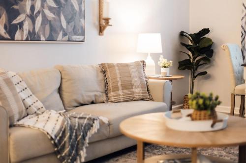 a living room with a couch and a table at Spacious 3 Bed Condo Near ETSU in Johnson City