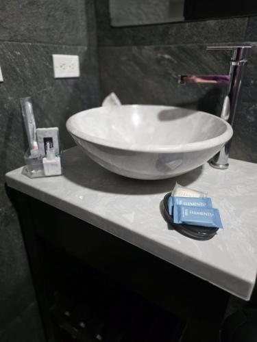 a bowl sink on a counter in a bathroom at Hotel y Suites Panda in San Luis Río Colorado
