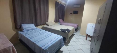 MK HOTEL Juruti 객실 침대