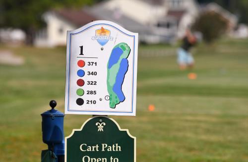 a sign for a car path on a golf course at Hidden Gem in Greenbackville
