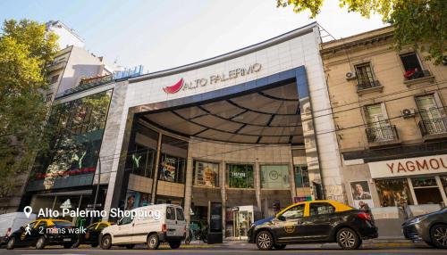 a store with cars parked in front of it at Modern Apartments in Palermo - by BueRentals in Buenos Aires