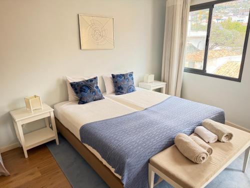 Llit o llits en una habitació de Apartments VMadeira