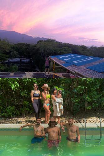 a group of people standing in a swimming pool at Bio Coliving Tayrona, Eco Retreat for You or Your group with Fast, Reliable WiFi & Power in Nature in Santa Marta