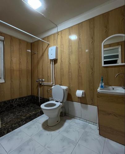 a bathroom with a toilet and a sink at Voyage in Sevan