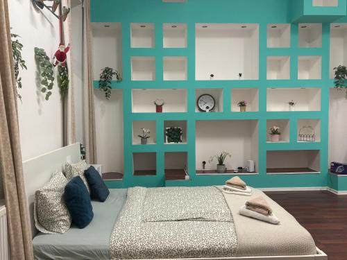 Teal Cubes Residence at Corvin