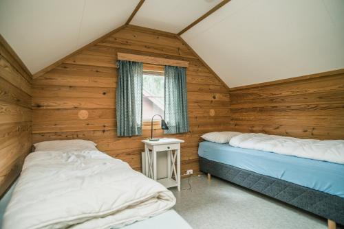 Postel nebo postele na pokoji v ubytování Jorekstad Ferieleiligheter