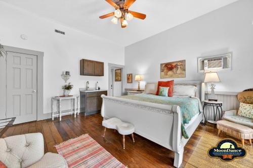 a bedroom with a bed and a ceiling fan at Nashville Suite 1 in Nashville