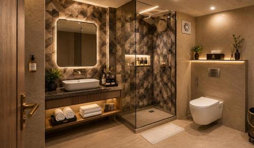 a bathroom with a shower and a toilet and a sink at ZED Plaza in New Delhi