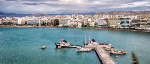 a group of boats docked in a body of water at Hara Hotel in Chalkida