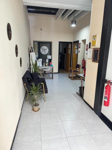 an office lobby with a hallway with a waiting room at SEVILLE YOUR WAY in Seville