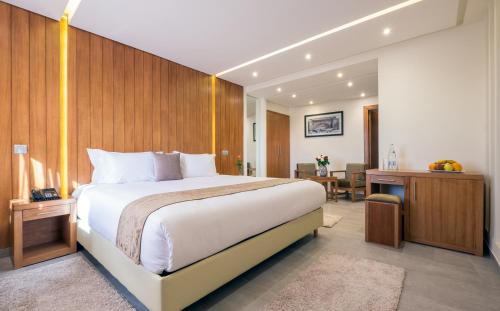 Postel nebo postele na pokoji v ubytování Hotel Ayoub & Spa