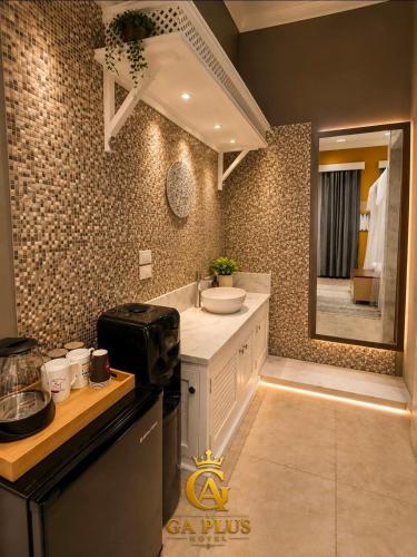 a bathroom with a sink and a mirror at GA Cairo Hotel Downtown in Cairo