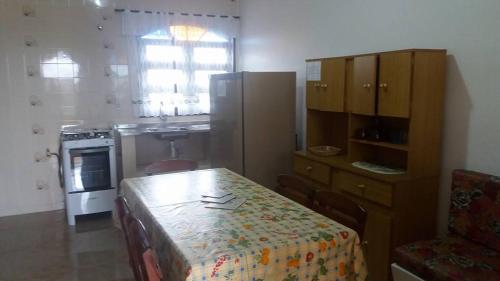 Η κουζίνα ή μικρή κουζίνα στο Vênus Apartamentos