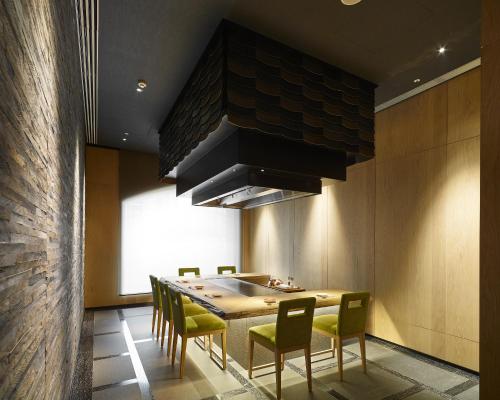 a dining room with a table and chairs at Grand Mayfull Taipei in Taipei