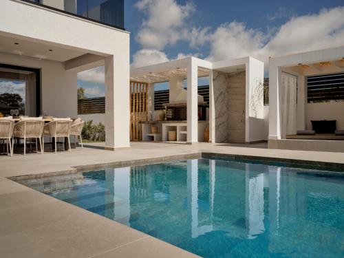 Nosel Villa, a Design Retreat with Iconic Pool, By ThinkVilla