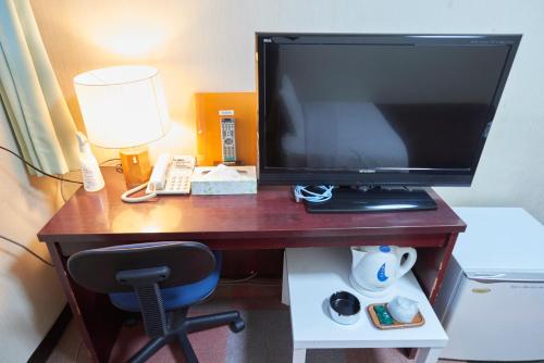 ホテルセレクトイン古川 にあるテレビまたはエンターテインメントセンター