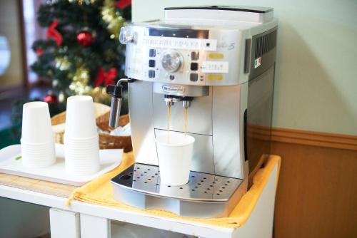 ホテルセレクトイン古川 にあるコーヒーまたはお茶