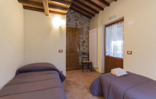 Una cama o camas en una habitación de Fonte Fredda