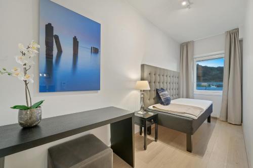 Katil atau katil-katil dalam bilik di Wright Apartments - Sørenga