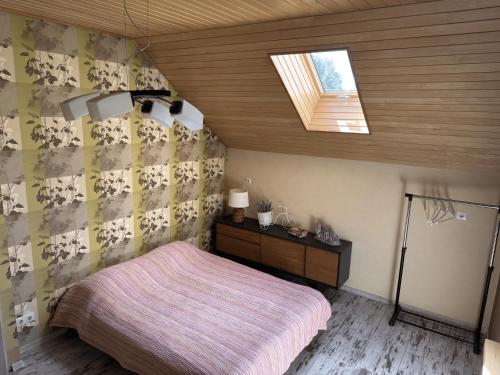 Llit o llits en una habitació de Kuru suvila