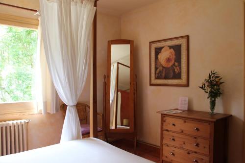 Ένα ή περισσότερα κρεβάτια σε δωμάτιο στο Hostal l´Ou de Reig