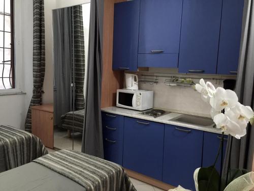 Η κουζίνα ή μικρή κουζίνα στο 1A Grace House