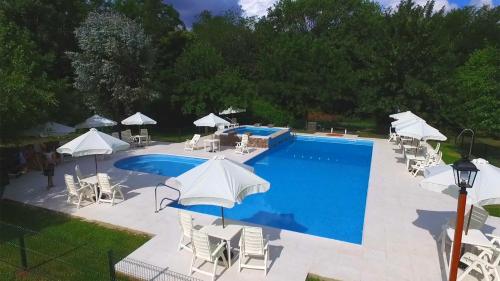 A view of the pool at Cabañas Am Bach or nearby
