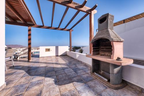 Villa - Lava and Sea - Pool, BBQ and Sea View By Lanzarote Vacation Homes