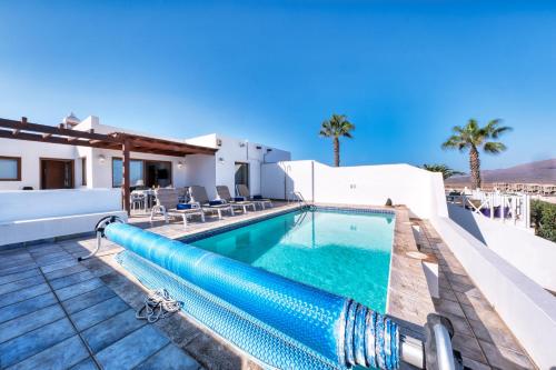 Villa - Lava and Sea - Pool, BBQ and Sea View By Lanzarote Vacation Homes