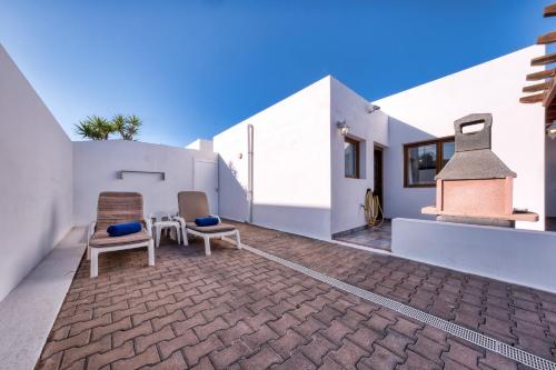 Villa - Lava and Sea - Pool, BBQ and Sea View By Lanzarote Vacation Homes