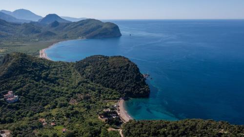 an aerial view of a island in the ocean at Apartments Via Mare in Petrovac na Moru