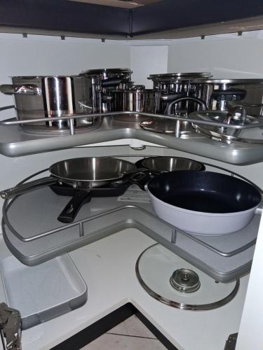 a kitchen with pots and pans on a counter at Fonso's Garden in Freudenstadt