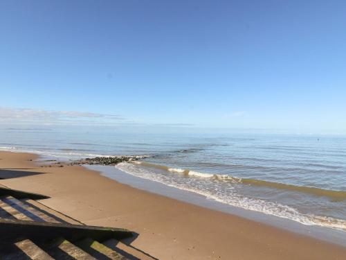 a view of the ocean from the beach at 6 Bastion Close in Prestatyn