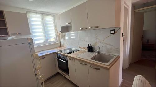 "Apartman More"