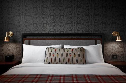 Un ou plusieurs lits dans un hébergement de l'établissement Hewing Hotel