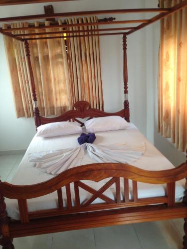Ein Bett oder Betten in einem Zimmer der Unterkunft Flamingo Guest house