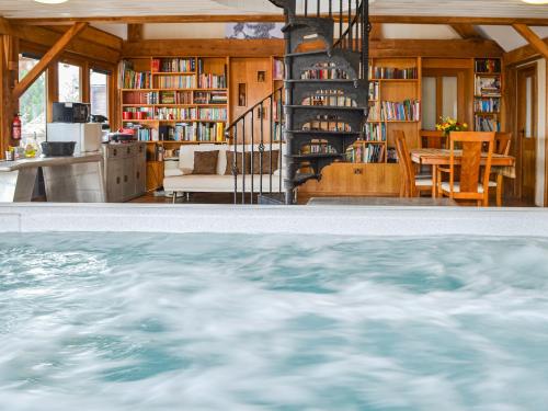 a view of a swimming pool in a house at Ty Nofio - Uk36421 in Talybont