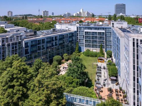 an aerial view of buildings in a city at Pullman Munich in Munich
