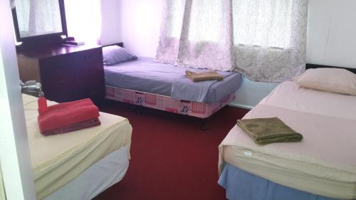 Letto o letti in una camera di Dayspring Lodge