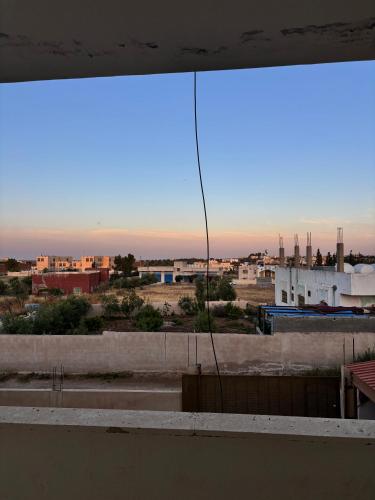 a view of a city from the roof of a building at Ahmmad Alshgoor in Şirfah