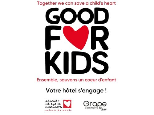 a poster for a charity event with a red heart at ibis budget Mâcon Nord in Mâcon