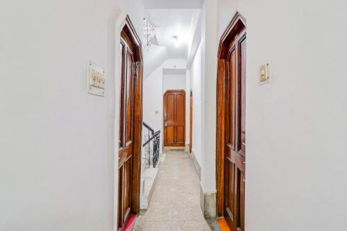 a hallway with two doors and a hallway with at Super Hotel O by OYO Kavish Residency in Haridwār