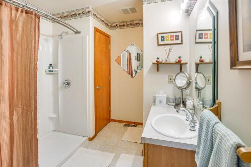 a bathroom with a sink and a shower at Charming Sequim House w/ Olympic Peninsula Views! in Sequim