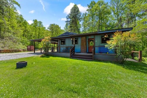 a house with a yard in front of it at Nantahala Ridge in Bryson City