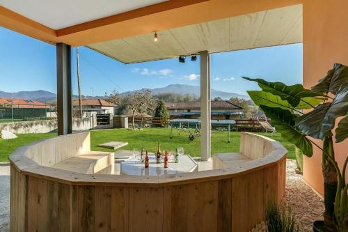 a hot tub in the backyard of a house at Villa Laura Private Pool and Garden near Lake Maggiore for 9 - Happy Rentals in Besozzo