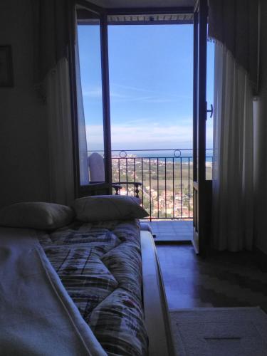 Posezení v ubytování La Casa Di Torre Di Palme